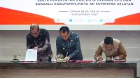 Pj Gubernur Sumsel Tanda Tangani NPHD Pilkada 2024